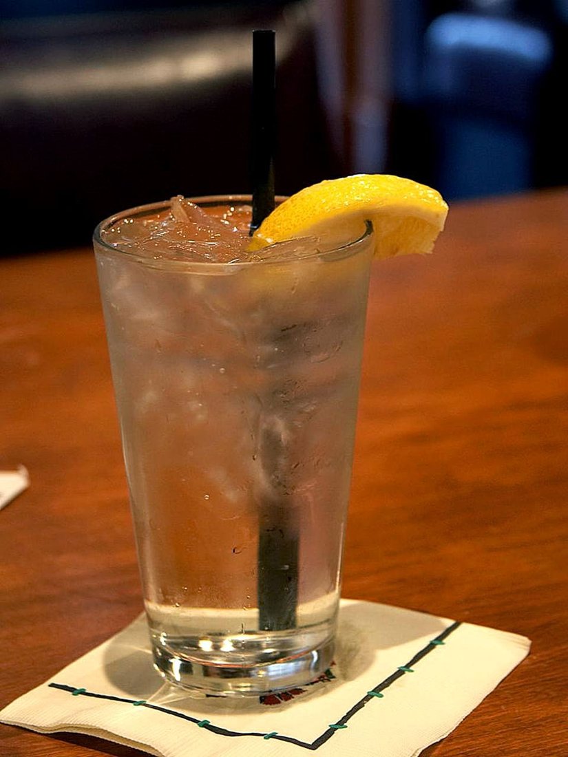 Glass of iced water with lemon