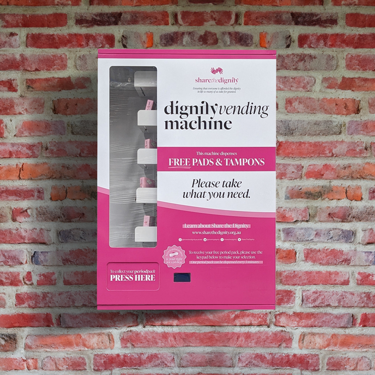 Wall mounted hygiene and consumables vending unit in a Melbourne workplace amenities area